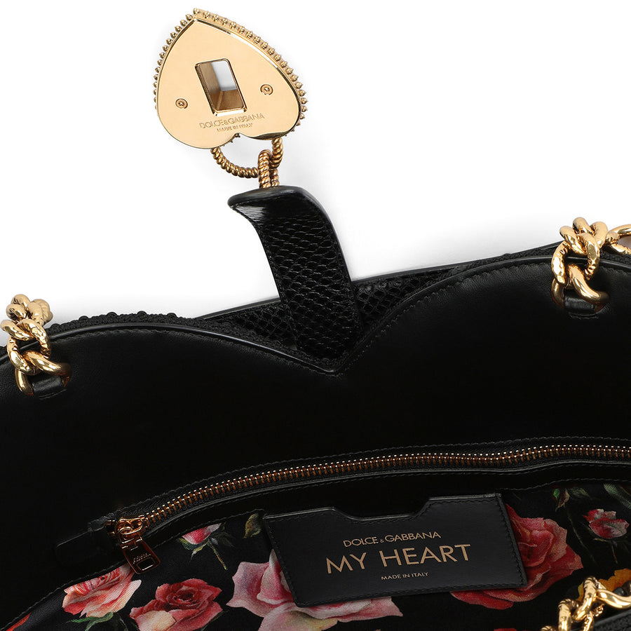 Heart-shaped bag with embroidered roses and fringes