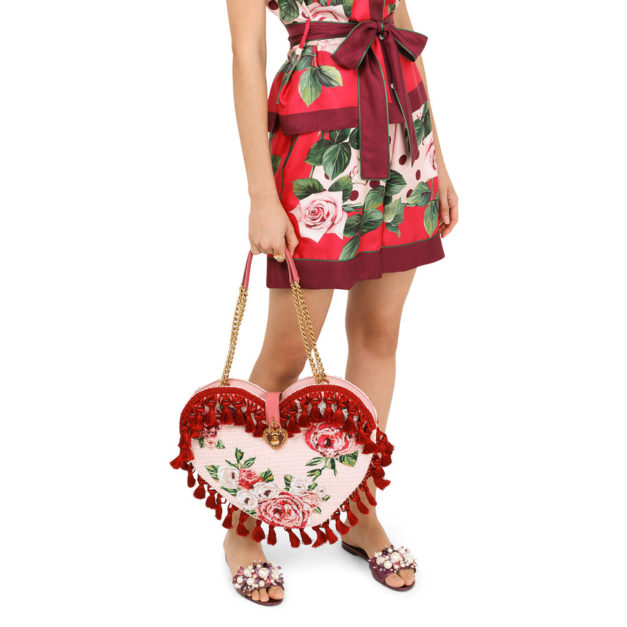 Heart-shaped bag with tassels and flowers