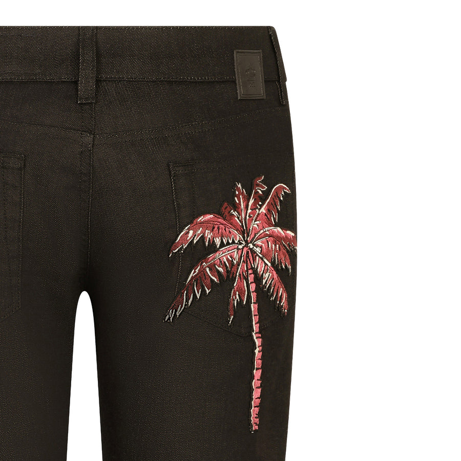 Five-pocket jeans with tropical palm patch