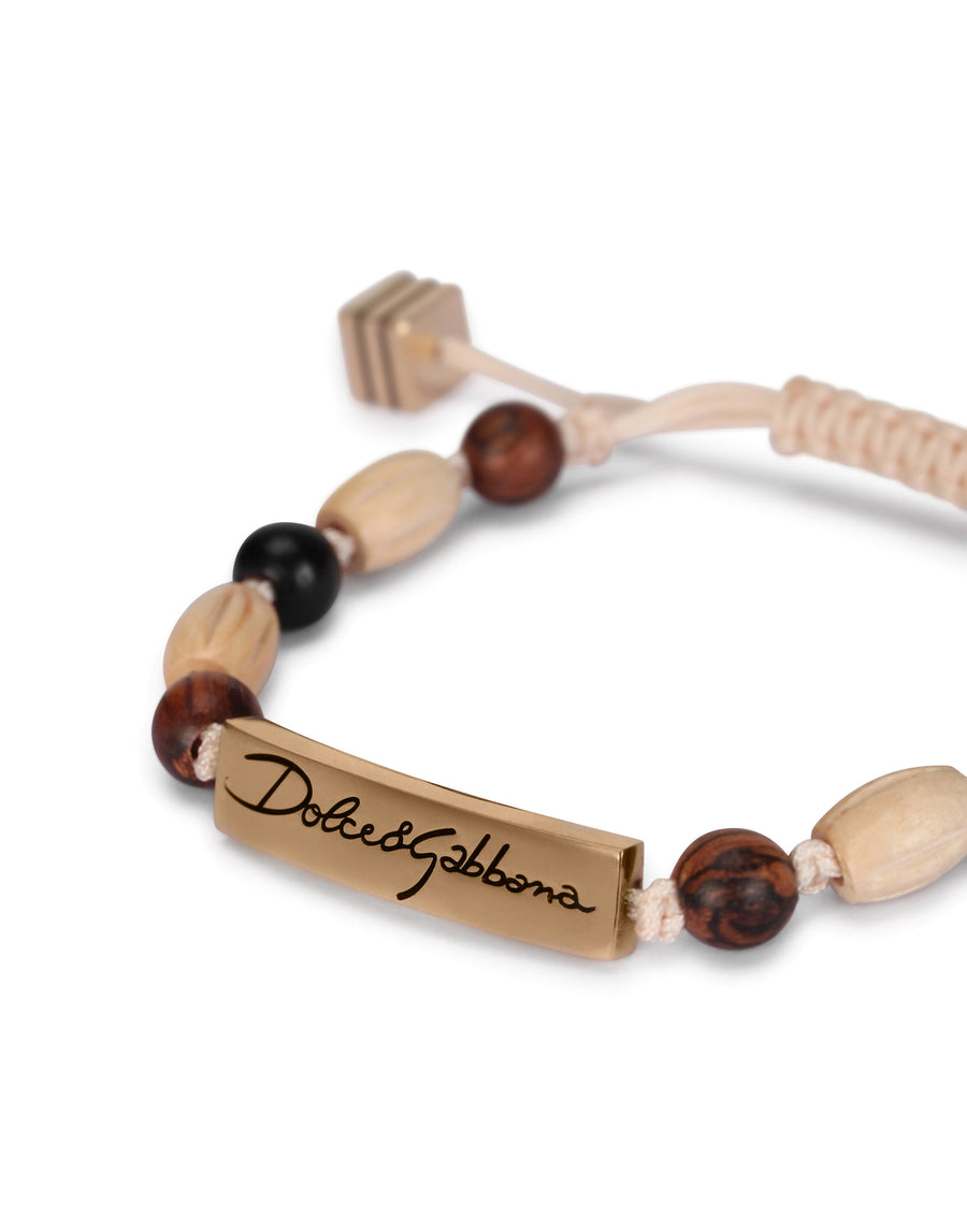 Cord bracelet with wooden spheres